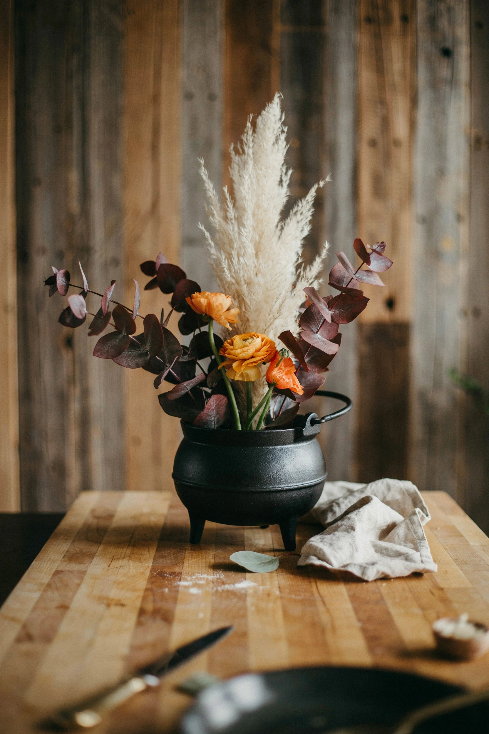 dried floral cauldron vase